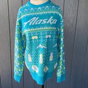 Alaska Airlines “ugly” Christmas or winter sweater.